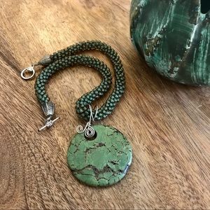 Hand-crafted green stone & bead necklace.